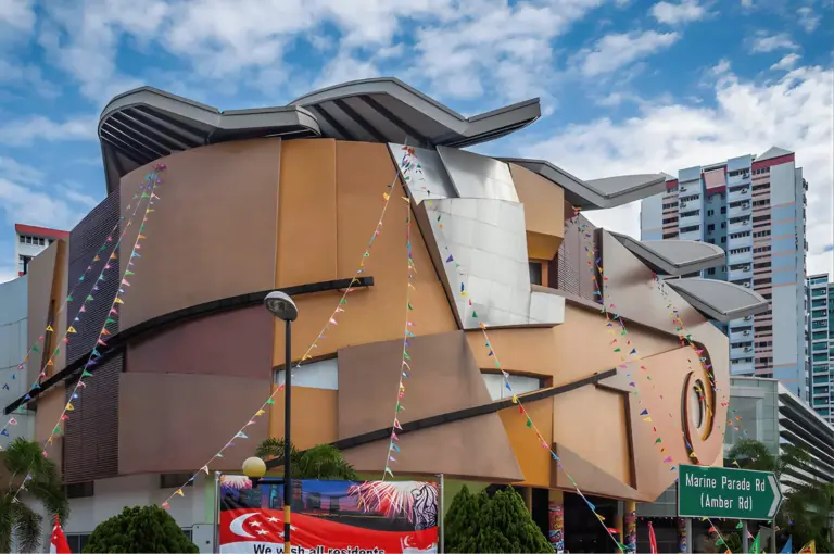 An aerial perspective of the Marine Parade residential estate near the coast, home to iconic hawker centers and popular East Coast seafood spots.