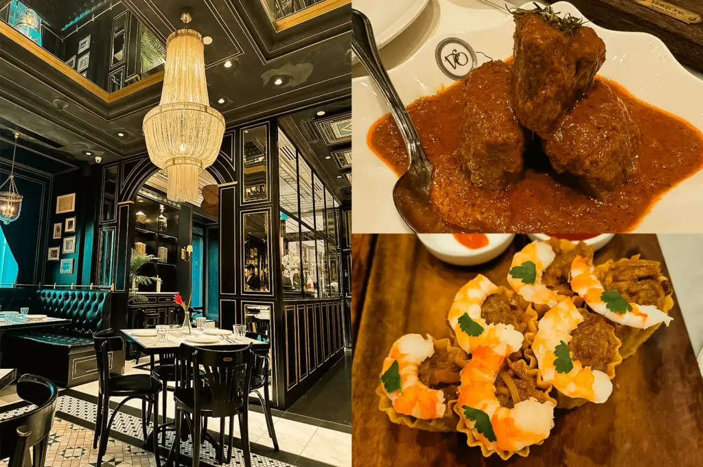“Left: Wide-angle eye-level view of an elegant restaurant dining room with a large crystal chandelier, dark paneled walls, mirrored accents, teal tufted banquette seating, black chairs, white table settings, and patterned tile flooring illuminated by warm ambient lighting. Upper Right: Close-up angle of beef rendang served on a white plate, featuring several pieces of beef coated in a thick reddish-brown sauce with a serving spoon resting beside the dish. Lower Right: Top-down close-up of Kuay Pie Tee arranged on a wooden serving board, with crisp pastry cups filled with a savory mixture and topped with shrimp and green herb leaves, highlighting contrasting textures and vibrant colors.”