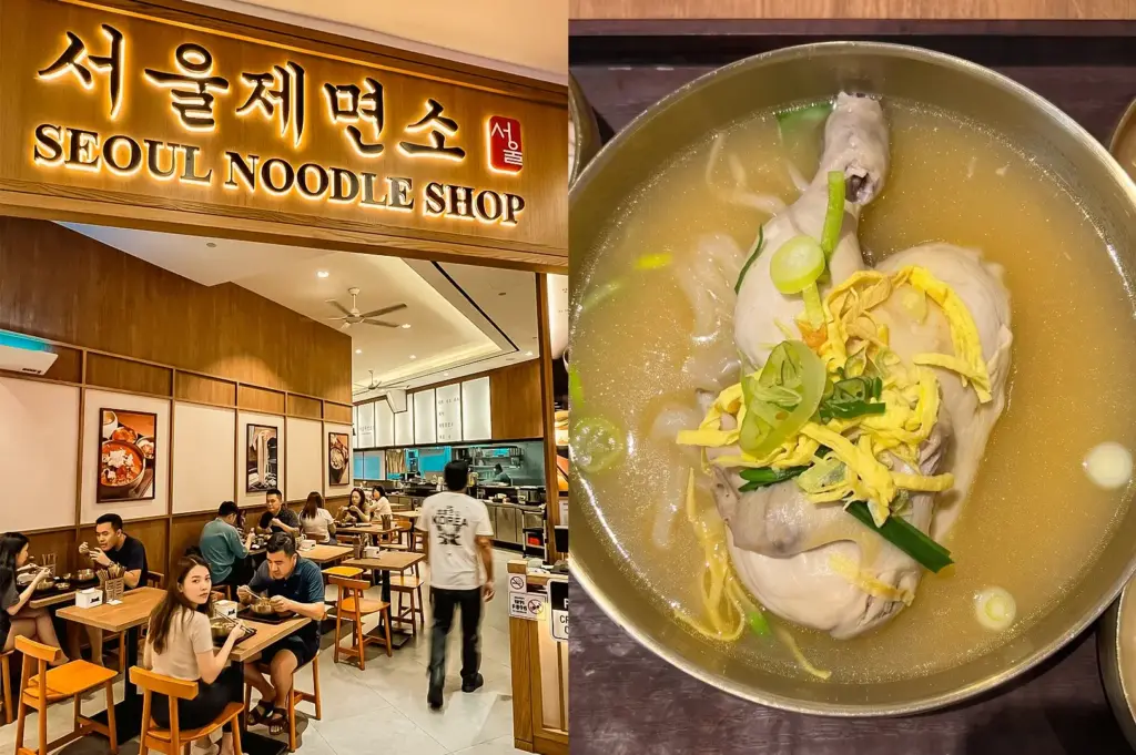 Left: Eye-level interior view of Seoul Noodle Shop restaurant, featuring a large illuminated wooden storefront sign with Korean characters and the text ‘SEOUL NOODLE SHOP,’ warm wood-paneled walls, framed food photography, light-colored tiled flooring, wooden tables and chairs, ceiling fans, and several diners seated throughout the dining area under bright ambient lighting. Right: Top-down close-up of a large metal bowl filled with clear golden broth, containing a whole chicken topped with sliced green onions and thin strips of yellow egg garnish, with visible noodles beneath the surface, smooth reflective metal edges, and a rich soup texture highlighted by warm indoor lighting.