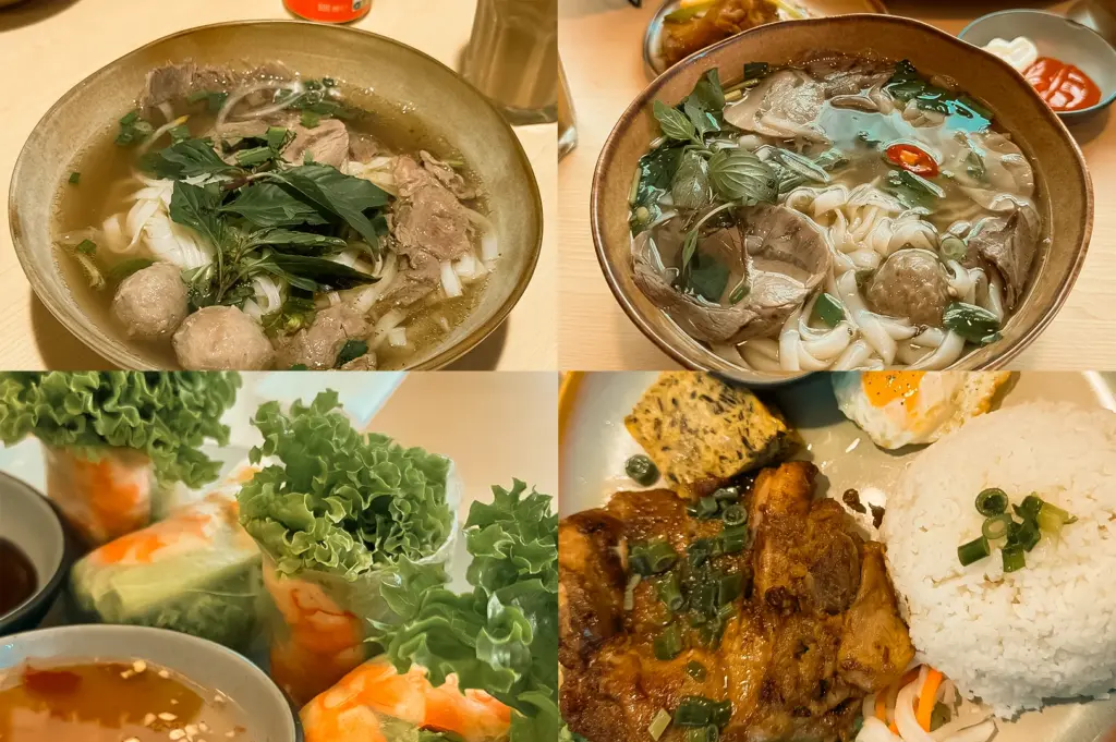 Upper Left: Top-down view of a bowl of Vietnamese beef pho with flat rice noodles, meatballs, sliced beef, and fresh herbs in clear broth on a wooden table. Upper Right: Top-down view of Vietnamese noodle soup with rice noodles, beef, meatballs, herbs, mushrooms, and chili in clear broth, with condiments in the background. Lower Left: Close-up of fresh Vietnamese spring rolls with shrimp, lettuce, and vegetables, served with dipping sauce. Lower Right: Top-down view of Vietnamese broken rice with grilled chicken, a fried egg, pickled vegetables, and a mound of white rice.