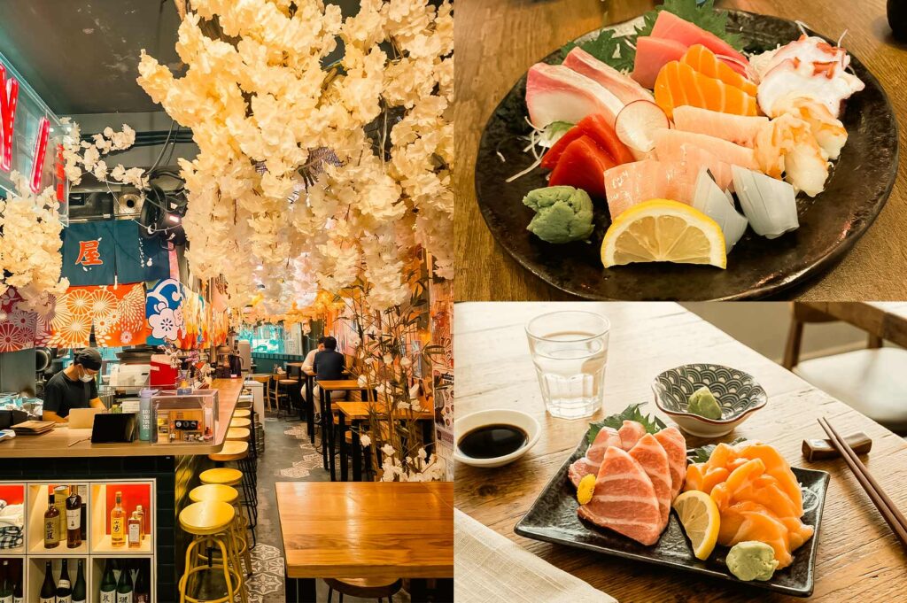 A three-panel collage showcasing a Japanese izakaya dining experience: the left panel features an vibrant interior adorned with hanging white cherry blossom florals, yellow bar stools, and a wooden counter; the top-right panel displays a round black plate filled with an assortment of raw fish, octopus, radish slices, and lemon; the bottom-right panel shows a rectangular plate set on a wooden table with thick, marbled otoro tuna slices and salmon sashimi alongside soy sauce and chopsticks.